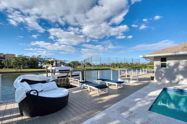 dock area with a water view