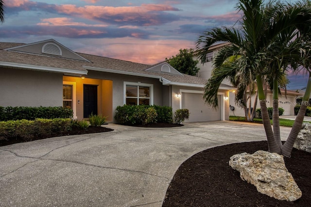 ranch-style home with a garage