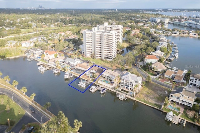 bird's eye view with a water view