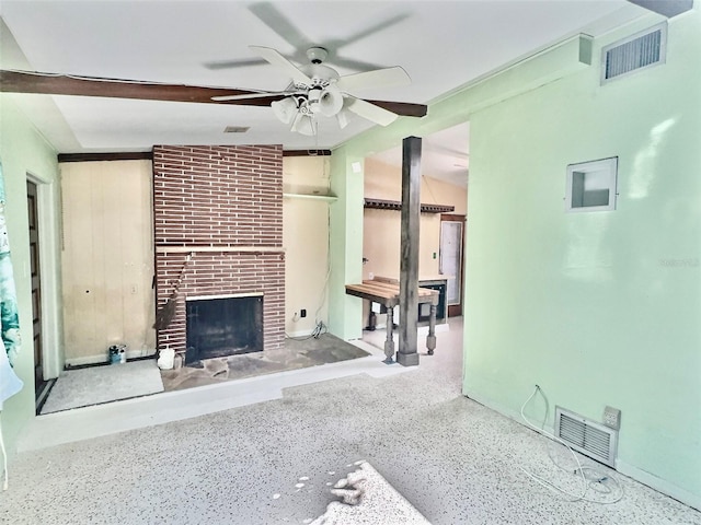 unfurnished living room with ceiling fan, vaulted ceiling, and a brick fireplace