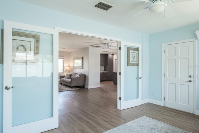 interior space with hardwood / wood-style floors and french doors