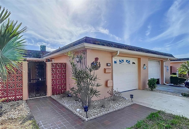 view of front of home featuring a garage