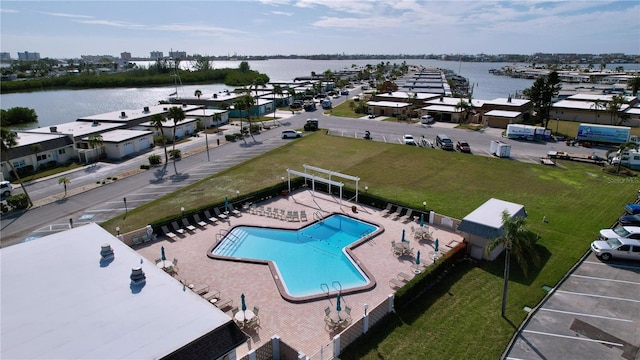 birds eye view of property featuring a water view