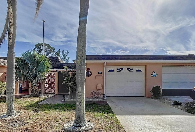 view of front of property with a garage