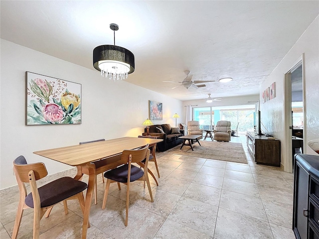 dining area featuring ceiling fan