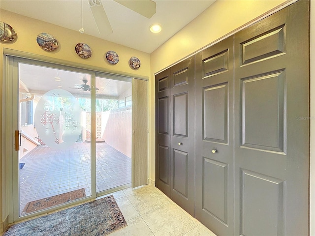 entryway featuring light tile patterned floors