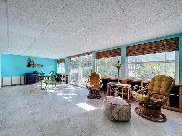 sunroom with a paneled ceiling