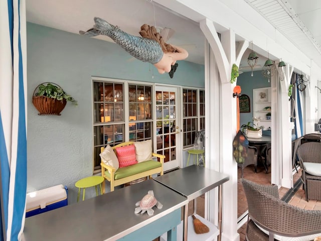 interior space featuring french doors and exterior bar