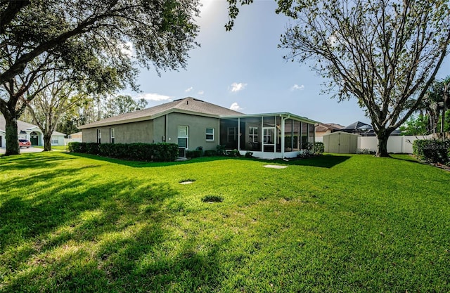 view of yard with a sunroom