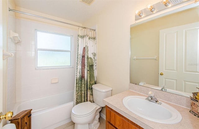 full bathroom featuring shower / bath combo, vanity, and toilet