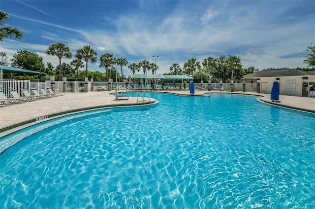 view of swimming pool with a patio area