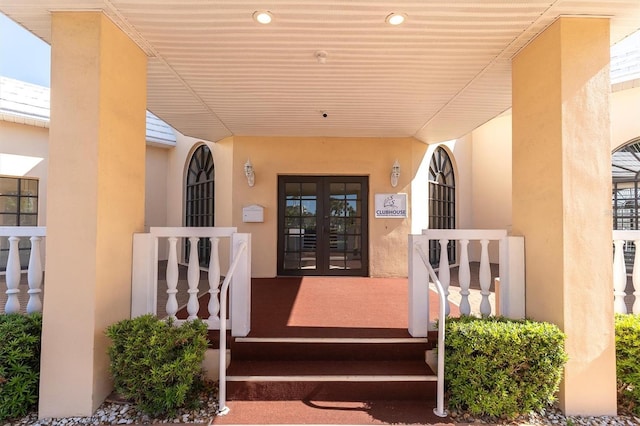 doorway to property featuring french doors