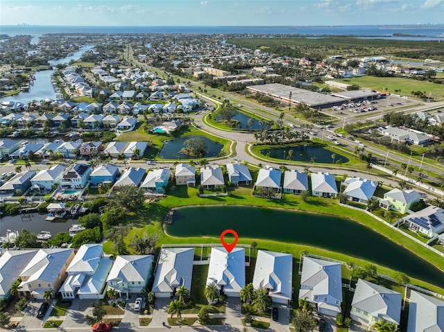 drone / aerial view with a water view