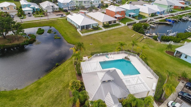 birds eye view of property featuring a water view