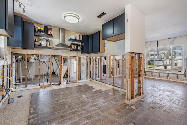 interior space with a textured ceiling