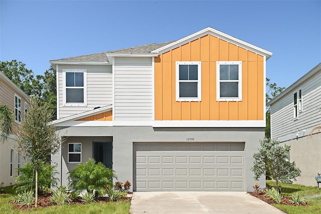 view of front of property featuring a garage