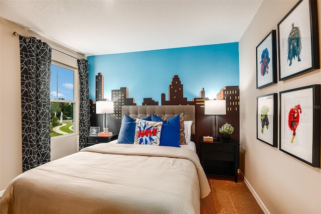 carpeted bedroom with a textured ceiling