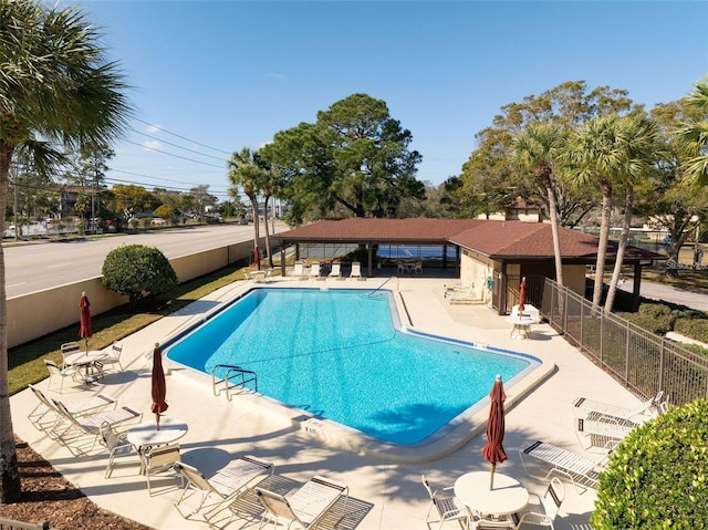 view of pool featuring a patio area