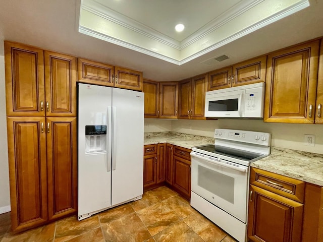 kitchen featuring light stone countertops, a raised ceiling, white appliances, and crown molding