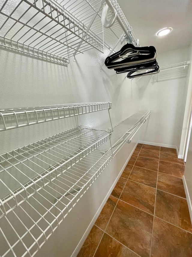 walk in closet featuring tile patterned floors