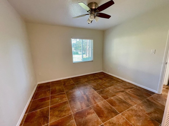 unfurnished room featuring ceiling fan