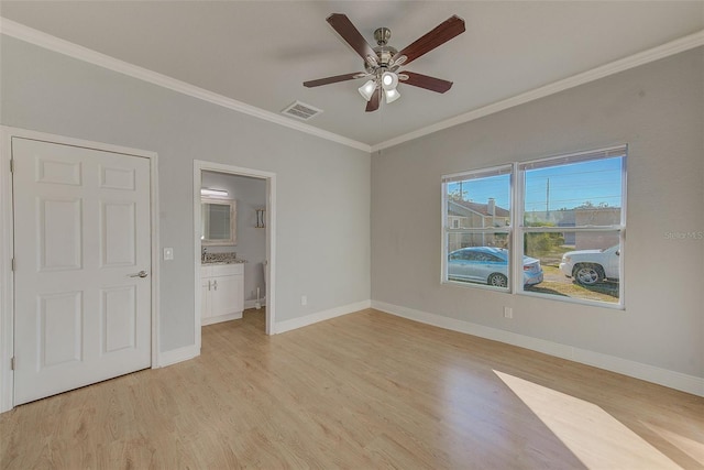 unfurnished bedroom with connected bathroom, ceiling fan, ornamental molding, and light wood-type flooring