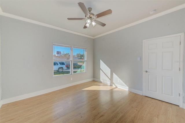 unfurnished room with crown molding, light hardwood / wood-style flooring, and ceiling fan