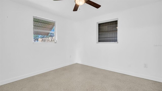 empty room featuring ceiling fan