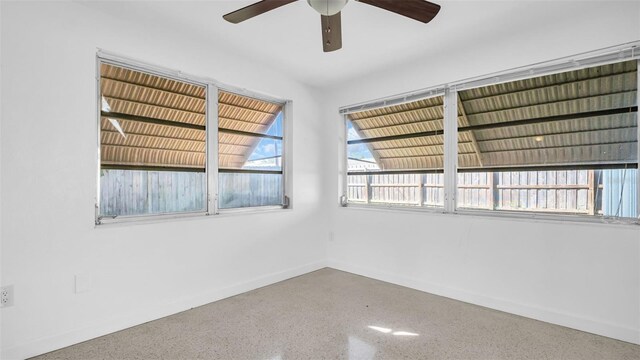 unfurnished room featuring ceiling fan