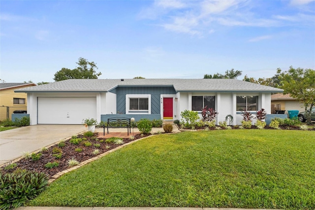 ranch-style home with a garage and a front lawn