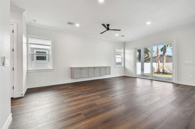 unfurnished room with dark hardwood / wood-style floors, ceiling fan, and ornamental molding