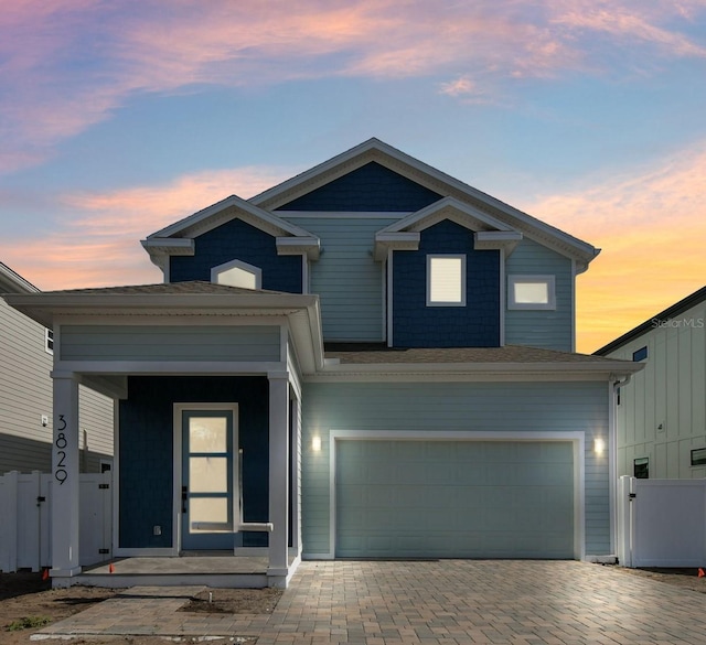 view of front of home with a garage