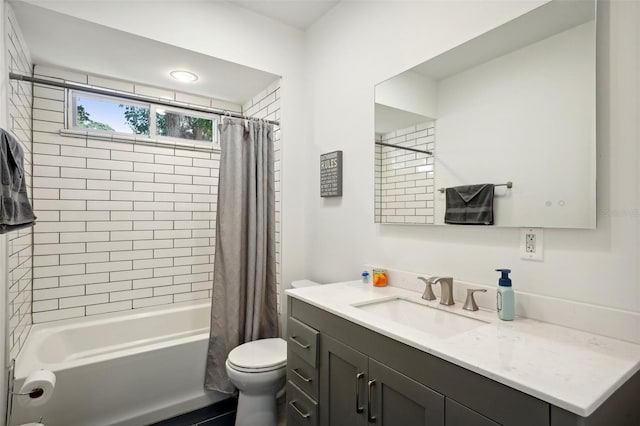 full bathroom with shower / bath combination with curtain, toilet, and vanity