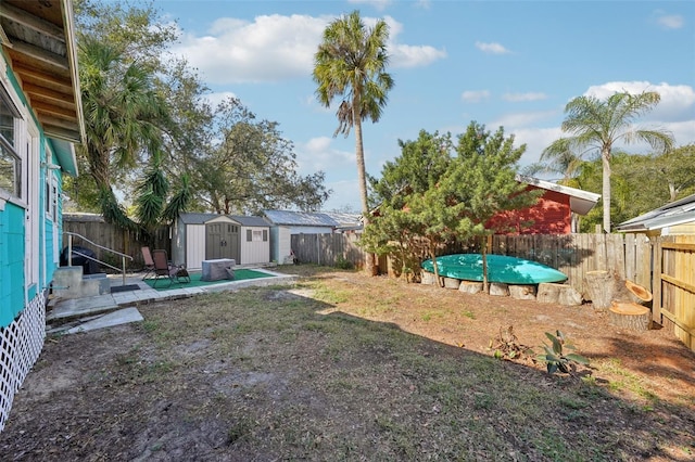 view of yard with a storage shed