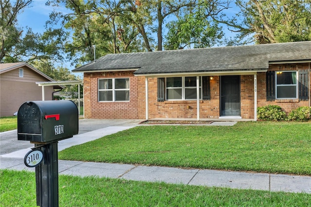 single story home with a front yard