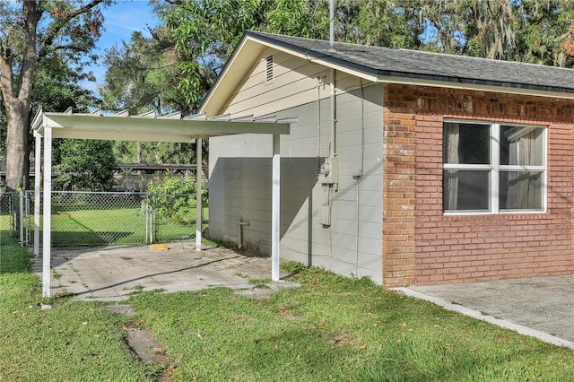 view of outbuilding featuring a yard