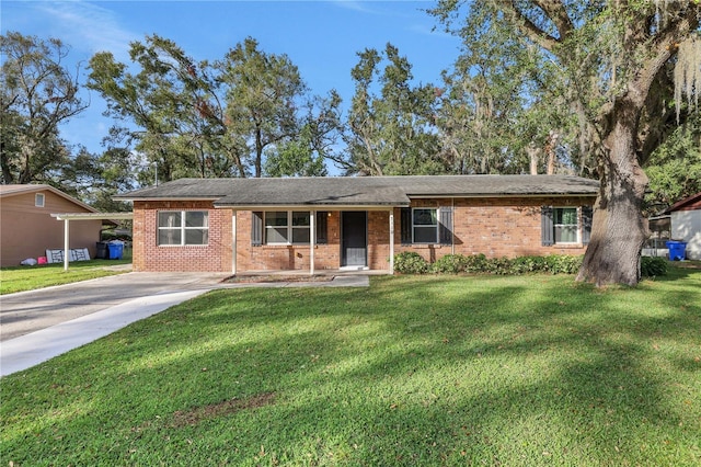 ranch-style home featuring a front yard