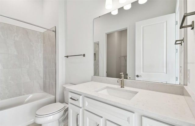 bathroom with vanity, toilet, and bathing tub / shower combination