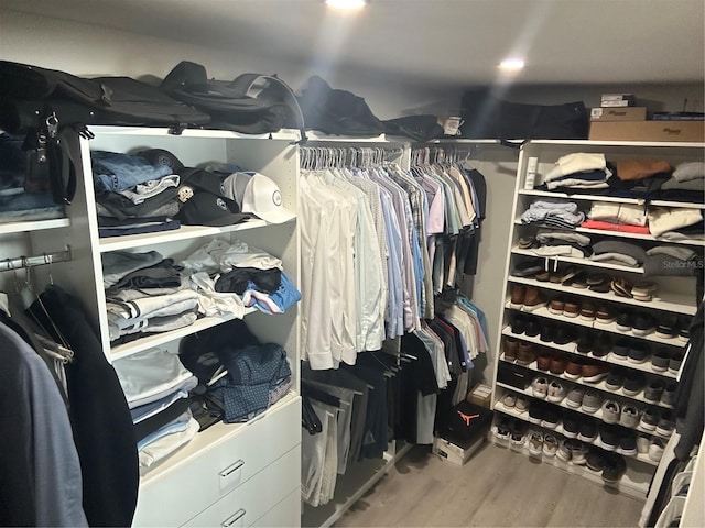 walk in closet featuring wood-type flooring