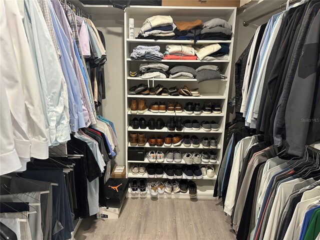 3963 Glen Oaks Manor Dr, Sarasota, FL 34232 - spacious closet with wood finished floors