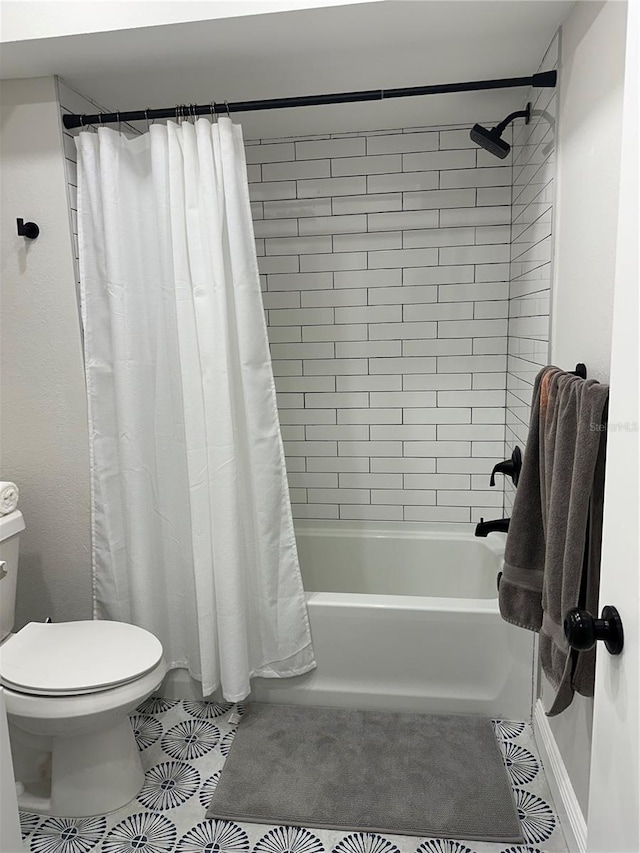3963 Glen Oaks Manor Dr, Sarasota, FL 34232 - full bathroom featuring tile patterned floors, shower / tub combo, and toilet