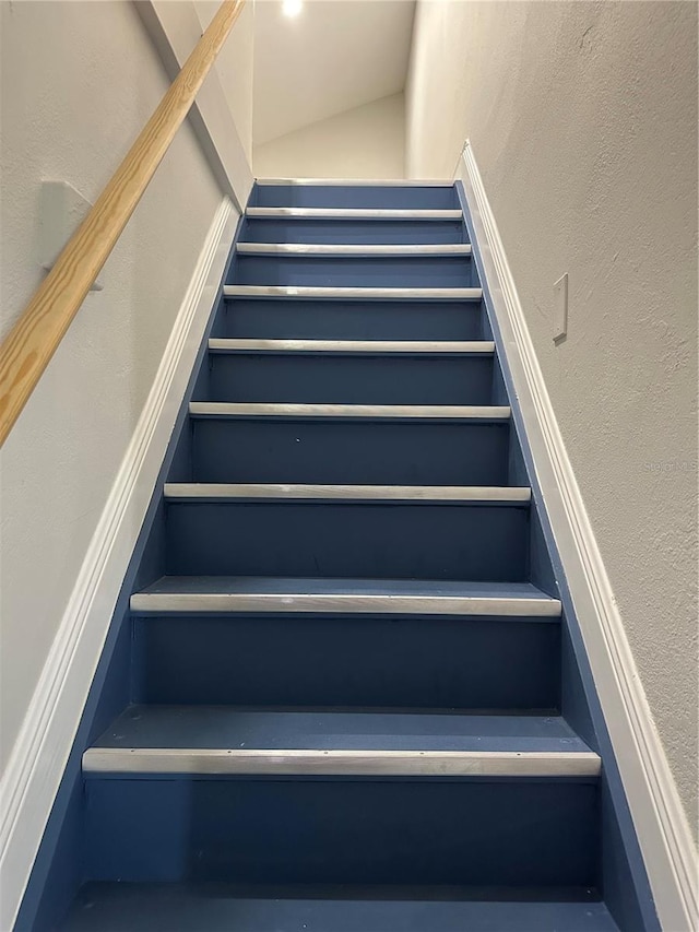 3963 Glen Oaks Manor Dr, Sarasota, FL 34232 - stairway with built in features and vaulted ceiling