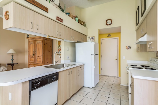 kitchen featuring sink, light brown cabinets, kitchen peninsula, white appliances, and light tile patterned flooring