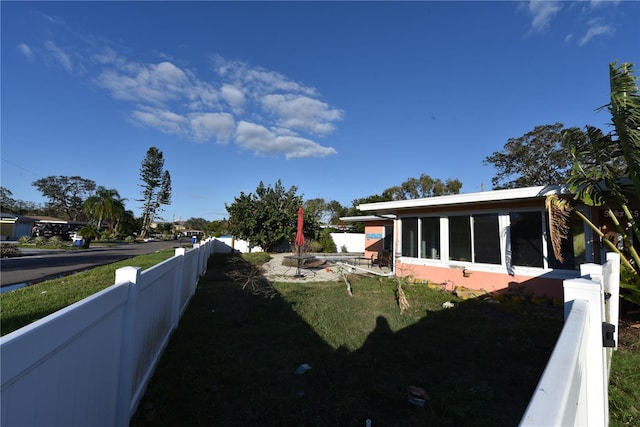 view of yard featuring fence