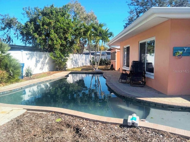 view of pool with a fenced backyard and a fenced in pool