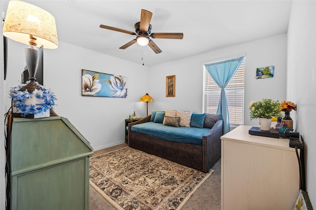 bedroom featuring ceiling fan and carpet floors