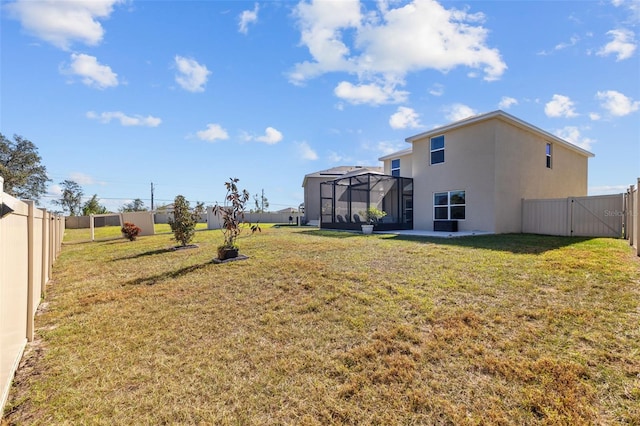 view of yard featuring a lanai