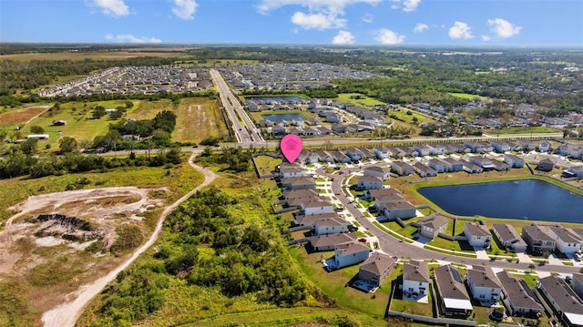 drone / aerial view featuring a water view