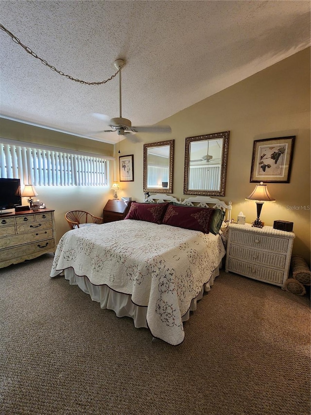 4632 Red Maple Rd Unit 1204, Bradenton, FL 34210 - bedroom featuring carpet, ceiling fan, vaulted ceiling, and a textured ceiling