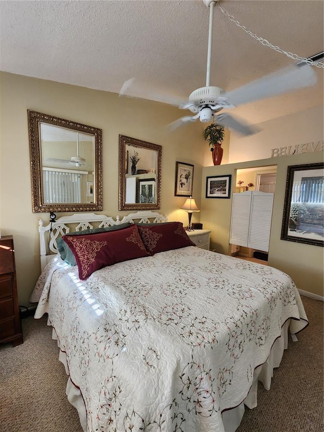 4632 Red Maple Rd Unit 1204, Bradenton, FL 34210 - bedroom with carpet floors, a ceiling fan, and a textured ceiling